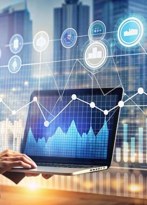 businessman-holding-laptop-with-financial-data_9975-22179