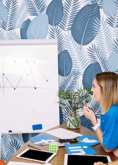 group-executive-wearing-social-media-t-shirt-planning-project_23-2147847454