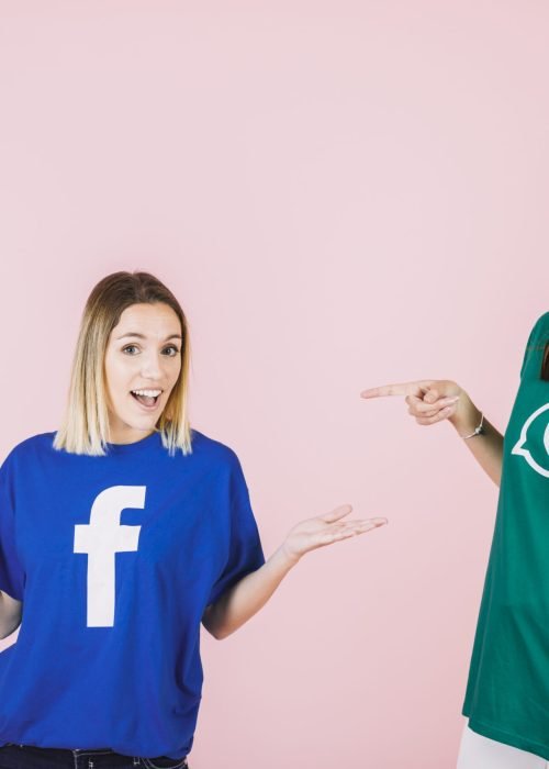 happy-woman-pointing-her-friend-shrugging